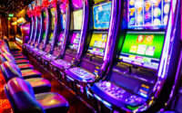 Line of electronic slot machines in casino. Property released.